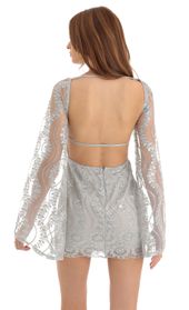 Picture thumb Vida Sequin Flare Sleve Dress in Silver. Source: https://media.lucyinthesky.com/data/Dec22/170xAUTO/0e21c84b-8255-42bd-adf6-2ef6212dfab2.jpg