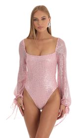 Picture thumb Amory Sequin Long Sleeve Bodysuit in Pink. Source: https://media.lucyinthesky.com/data/Dec22/170xAUTO/34cfaf03-8a51-47cb-a3a1-b1438a12c949.jpg