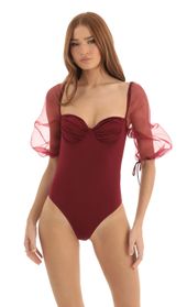 Picture thumb Adrianna Puff Sleeve Bodysuit in Red. Source: https://media.lucyinthesky.com/data/Dec22/170xAUTO/49239004-e33e-4881-be6e-10f063ad96fc.jpg