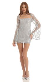 Picture thumb Vida Sequin Flare Sleve Dress in Silver. Source: https://media.lucyinthesky.com/data/Dec22/170xAUTO/7cdc0a0b-edcc-429b-836e-37c6aa44ae1e.jpg
