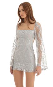 Picture thumb Vida Sequin Flare Sleve Dress in Silver. Source: https://media.lucyinthesky.com/data/Dec22/170xAUTO/7fb38556-23d2-452c-a8d0-4a2d044d7709.jpg
