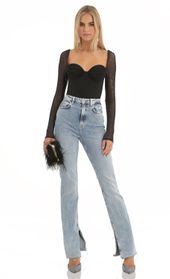 Picture thumb Evonne Glitter Mesh Long Sleeve Bodysuit in Black. Source: https://media.lucyinthesky.com/data/Dec22/170xAUTO/90c4a177-5e61-41d2-9cae-e18cd7e6ac9a.jpg