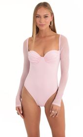 Picture thumb Evonne Glitter Mesh Long Sleeve Bodysuit in Pink. Source: https://media.lucyinthesky.com/data/Dec22/170xAUTO/91763d6b-51fa-459b-9b2c-1af4fae8641e.jpg