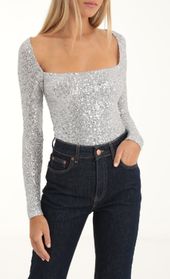 Picture thumb Aislin Sequin Long Sleeve Bodysuit in Silver. Source: https://media.lucyinthesky.com/data/Dec22/170xAUTO/a2928f91-953a-4a9a-a2d4-f0407b7dfb76.jpg