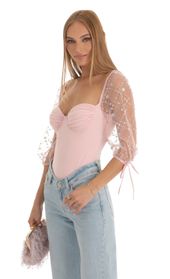 Picture thumb Adrianna Sequin Puff Sleeve Bodysuit in Pink. Source: https://media.lucyinthesky.com/data/Dec22/170xAUTO/aa6228e3-feb8-4117-821f-cfd3930ec9b5.jpg