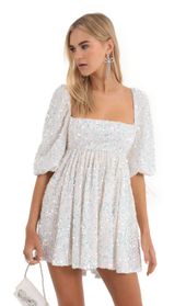 Picture thumb Afia Velvet Sequin Baby Doll Dress in White. Source: https://media.lucyinthesky.com/data/Dec22/170xAUTO/bb471778-bf44-41d0-9393-896442536b52.jpg