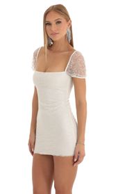 Picture thumb Clarita Glitter Short Sleeve Bodycon Dress in White. Source: https://media.lucyinthesky.com/data/Dec22/170xAUTO/cb833d5c-504d-4cd2-ae51-c886edcc679a.jpg