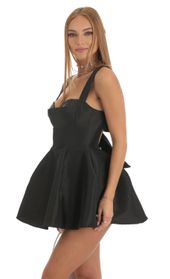 Picture thumb Kassidy Sequin Bust A-Line Dress in Black. Source: https://media.lucyinthesky.com/data/Dec22/170xAUTO/cfa333c3-6f7e-4a65-aa74-cf63c550ba7d.jpg