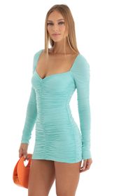 Picture thumb Audria Ruched Bodycon Dress in Turquoise. Source: https://media.lucyinthesky.com/data/Dec22/170xAUTO/d51fe90c-8147-478d-bc2b-ca522567b1af.jpg