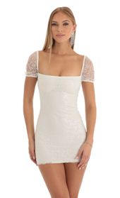 Picture thumb Clarita Glitter Short Sleeve Bodycon Dress in White. Source: https://media.lucyinthesky.com/data/Dec22/170xAUTO/e65d94f9-25d2-4c24-96d4-90da39ab86ae.jpg
