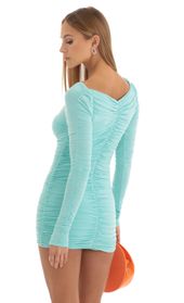 Picture thumb Audria Ruched Bodycon Dress in Turquoise. Source: https://media.lucyinthesky.com/data/Dec22/170xAUTO/e881c30d-75db-46d1-88d3-a494f72f756a.jpg