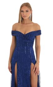 Picture thumb Sena Sequin Striped Off The Shoulder Maxi Dress in Blue. Source: https://media.lucyinthesky.com/data/Dec22/170xAUTO/e9b7351a-6f2f-445f-90fd-33b2022b491a.jpg