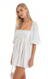 Picture thumb Afia Velvet Sequin Baby Doll Dress in White. Source: https://media.lucyinthesky.com/data/Dec22/170xAUTO/f41ad357-5080-4e0b-9f0c-a6a3b506ef52.jpg