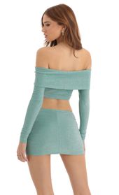 Picture thumb Sama Metallic Knit Two Piece Skirt Set in Turquoise. Source: https://media.lucyinthesky.com/data/Dec22/170xAUTO/fcd8191b-60c7-4364-b16e-84c5742904db.jpg