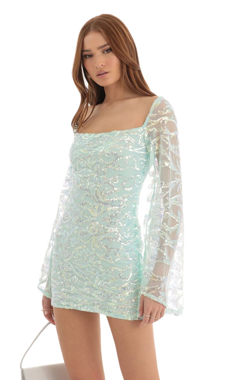 Picture Elly Flare Sleeve Sequin Dress in Turquoise. Source: https://media.lucyinthesky.com/data/Dec22/800xAUTO/0b664867-489d-454f-bad3-28e6b2f72f3e.jpg