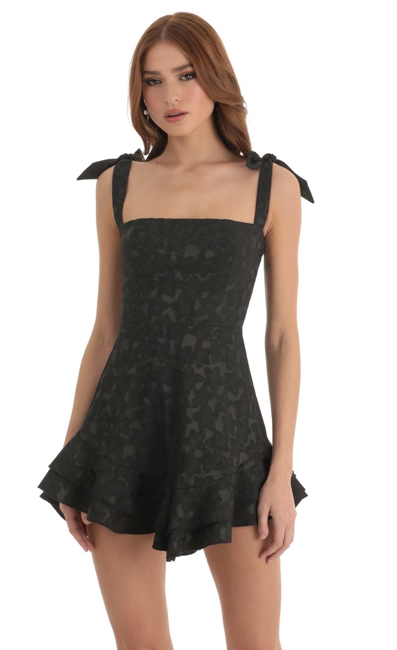 Picture Tallie Floral Jacquard Ruffle Dress in Black. Source: https://media.lucyinthesky.com/data/Dec22/800xAUTO/2ca16910-28d4-4c2e-9a24-4f007c949f5e.jpg