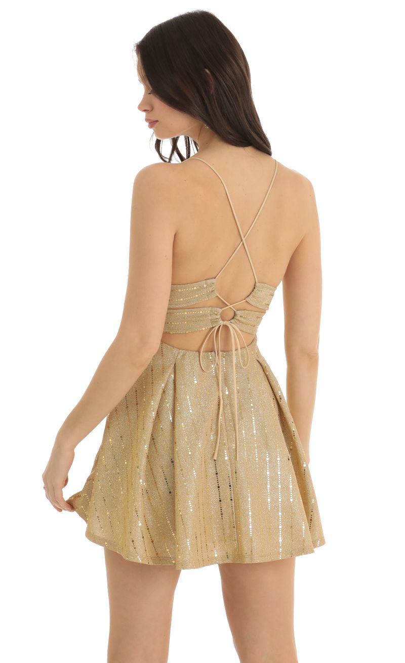 Picture Janine Sequin Striped Fit and Flare Dress in Gold. Source: https://media.lucyinthesky.com/data/Dec22/800xAUTO/99dd0b3f-6d20-4651-8cd6-985778faf84a.jpg