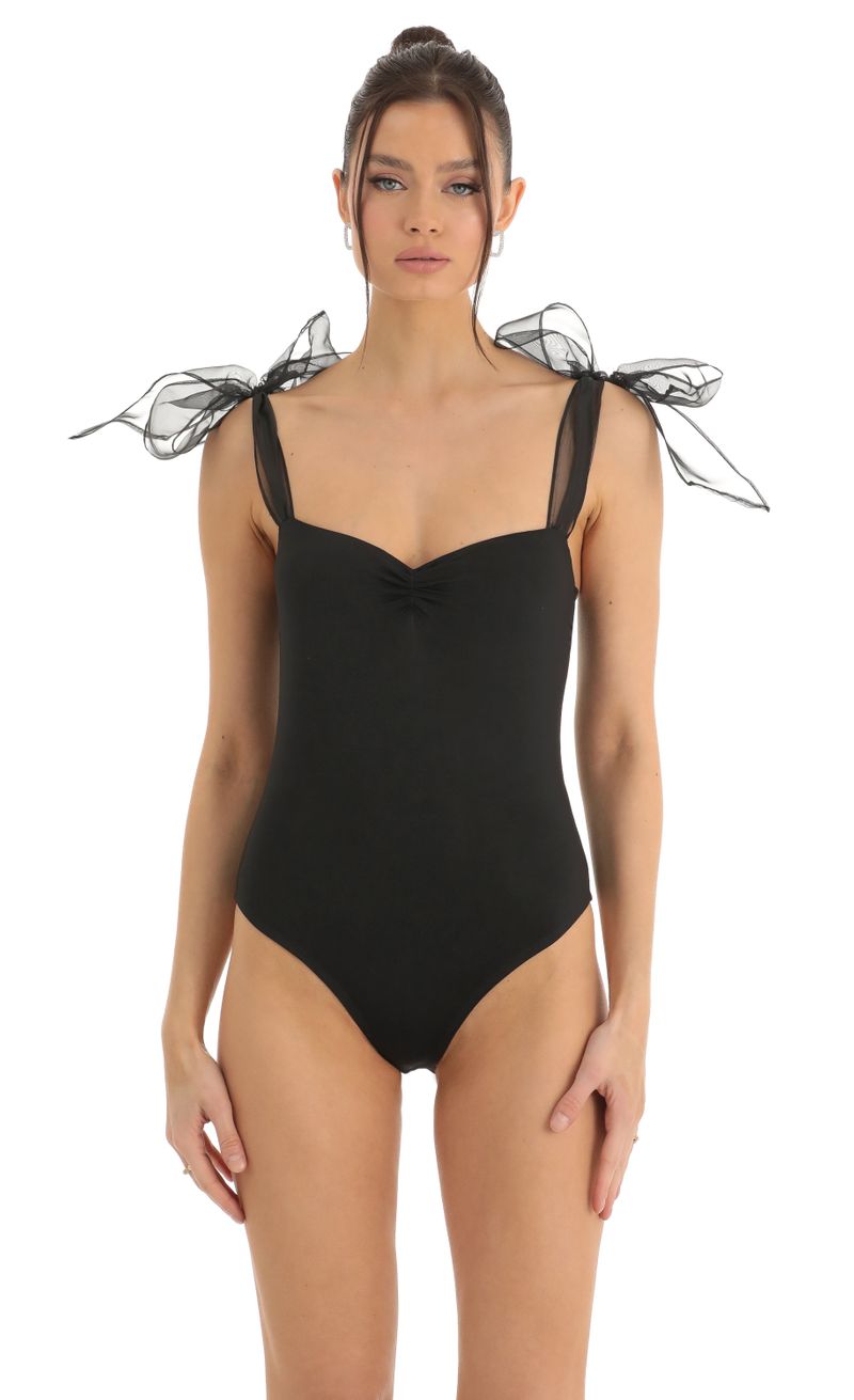 Picture Traci Bow Bodysuit in Black. Source: https://media.lucyinthesky.com/data/Dec22/800xAUTO/9a188e3f-553b-45e9-a00c-a07f29d4d7af.jpg