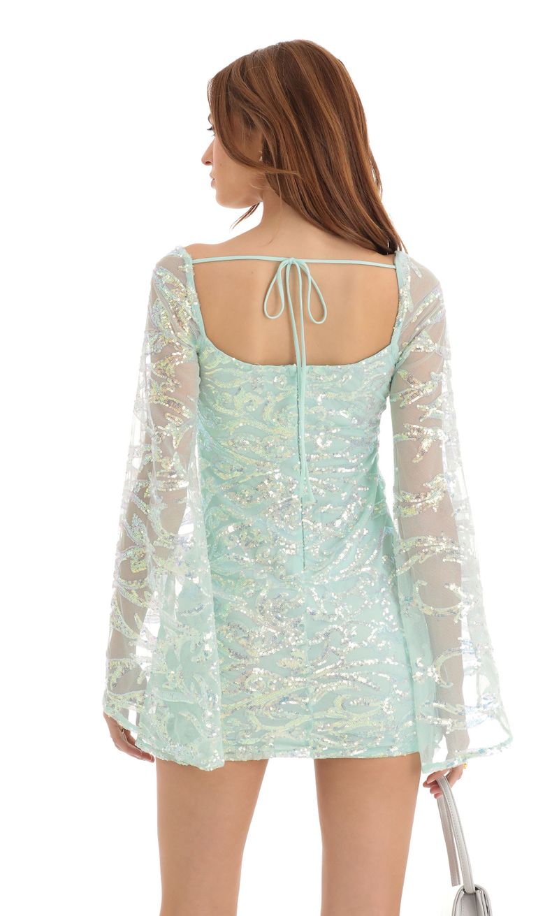 Picture Elly Flare Sleeve Sequin Dress in Turquoise. Source: https://media.lucyinthesky.com/data/Dec22/800xAUTO/9b62a435-7098-4e53-b482-5b54f6bb49d9.jpg