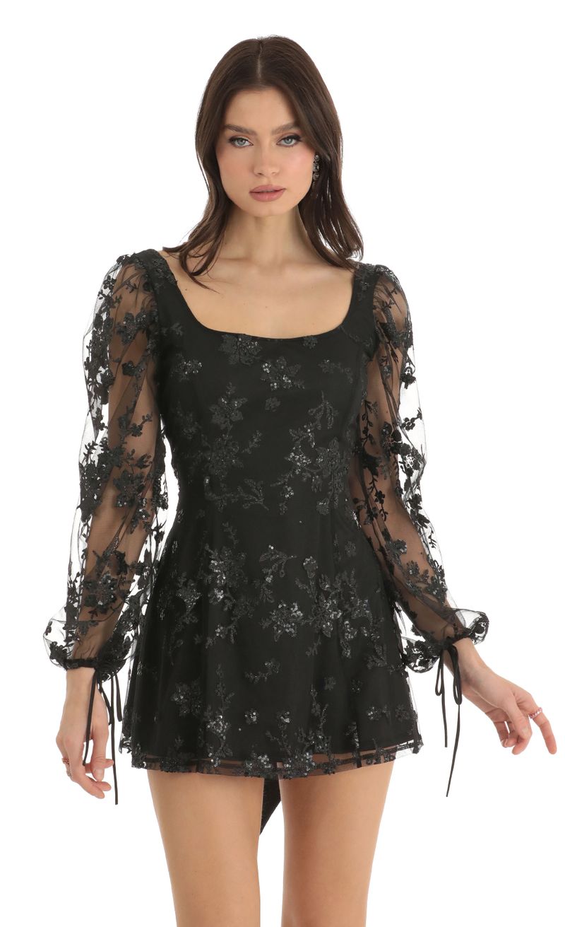 Picture Betty Floral Glitter A-Line Dress in Black. Source: https://media.lucyinthesky.com/data/Dec22/800xAUTO/a2005b50-b099-41e0-b2a7-dea96c9a679c.jpg