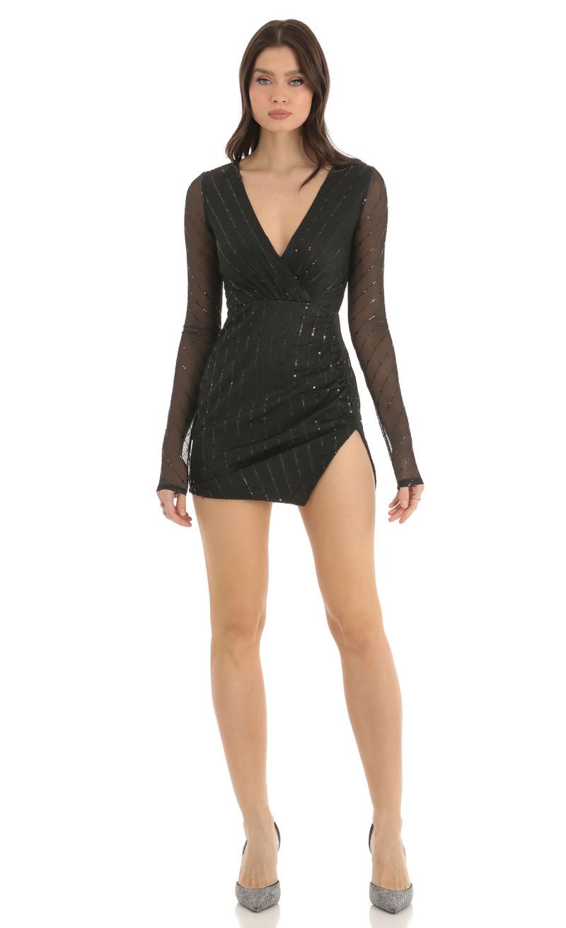 Picture Lennox Striped Sequin Long Sleeve Dress in Black. Source: https://media.lucyinthesky.com/data/Dec22/800xAUTO/c1b354b5-064d-4cb1-931c-54a48e4a70c1.jpg