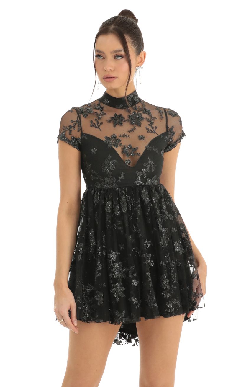Picture Cecily Floral Sequin Baby Doll Dress in Black. Source: https://media.lucyinthesky.com/data/Dec22/800xAUTO/e08a9717-150a-45be-8fc0-f5b394a98529.jpg