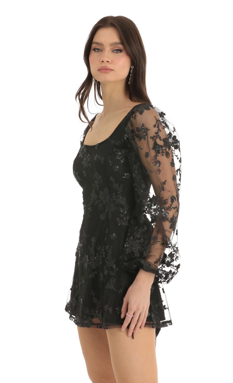 Picture Betty Floral Glitter A-Line Dress in Black. Source: https://media.lucyinthesky.com/data/Dec22/800xAUTO/ea88a07a-6a97-4996-b432-2e032980a762.jpg