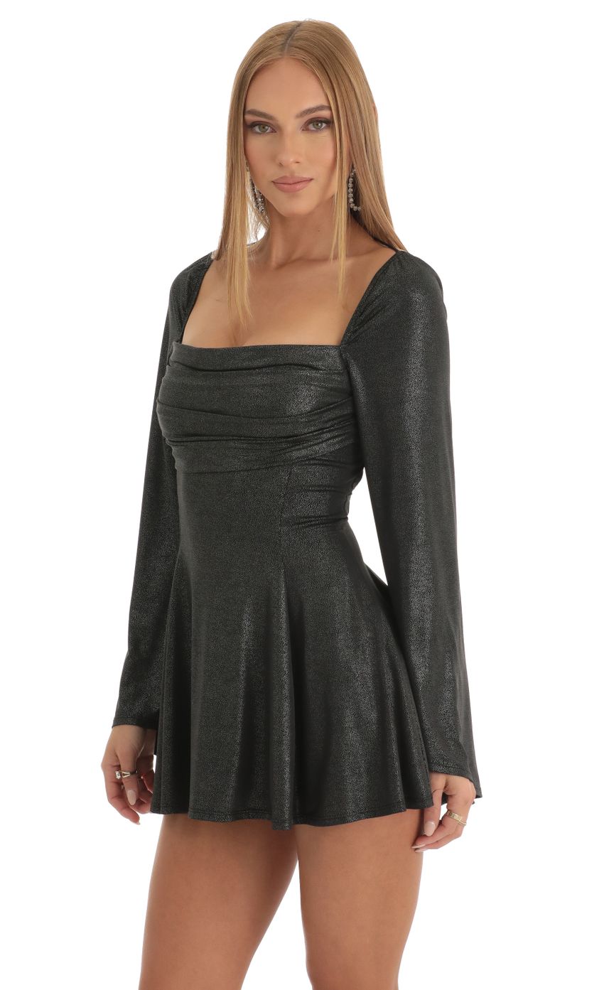 Picture Sirena Foil Flare Sleeve Dress in Black. Source: https://media.lucyinthesky.com/data/Dec22/850xAUTO/04692371-b5e2-41d4-bc62-584faca1b584.jpg