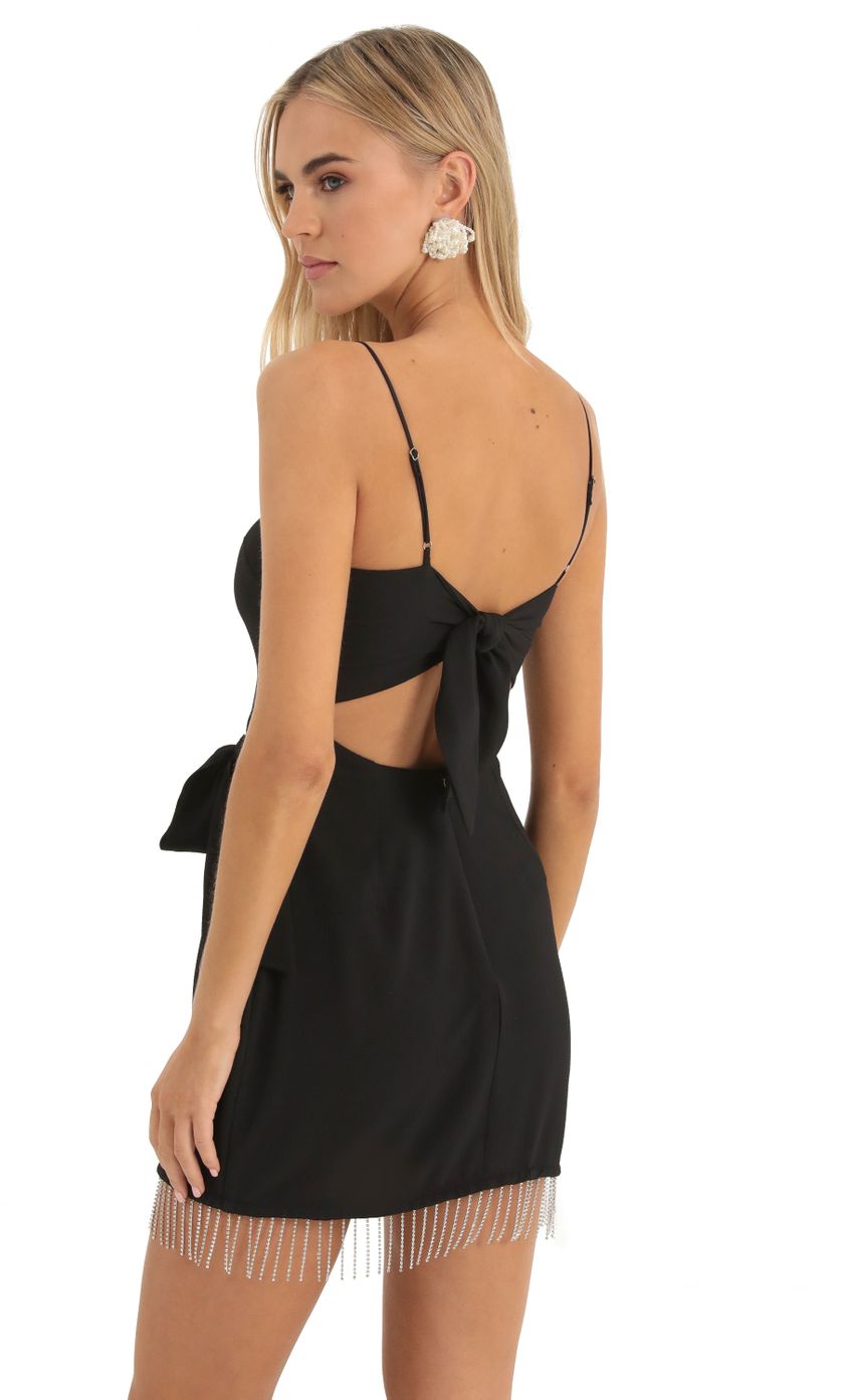 Picture Darla Rhinestone Crepe Wrap Dress in Black. Source: https://media.lucyinthesky.com/data/Dec22/850xAUTO/16cc3138-69c1-47e5-af05-7007c2bc3ab9.jpg