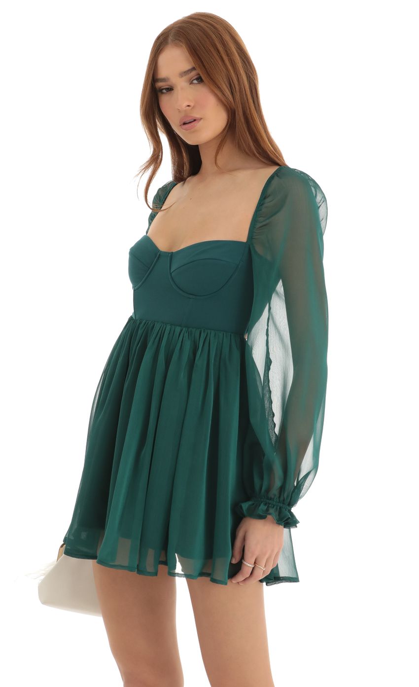 Picture Murphy Corset Long Sleeve Dress in Green. Source: https://media.lucyinthesky.com/data/Dec22/850xAUTO/22784e09-4a9d-4ca4-bf13-1358e14192a6.jpg