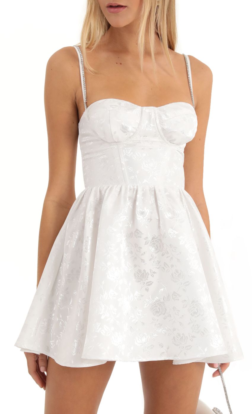 Picture Tabby Floral Jacquard Corset Dress in White. Source: https://media.lucyinthesky.com/data/Dec22/850xAUTO/27881f61-ba62-4e7f-9f0e-95f331183813.jpg