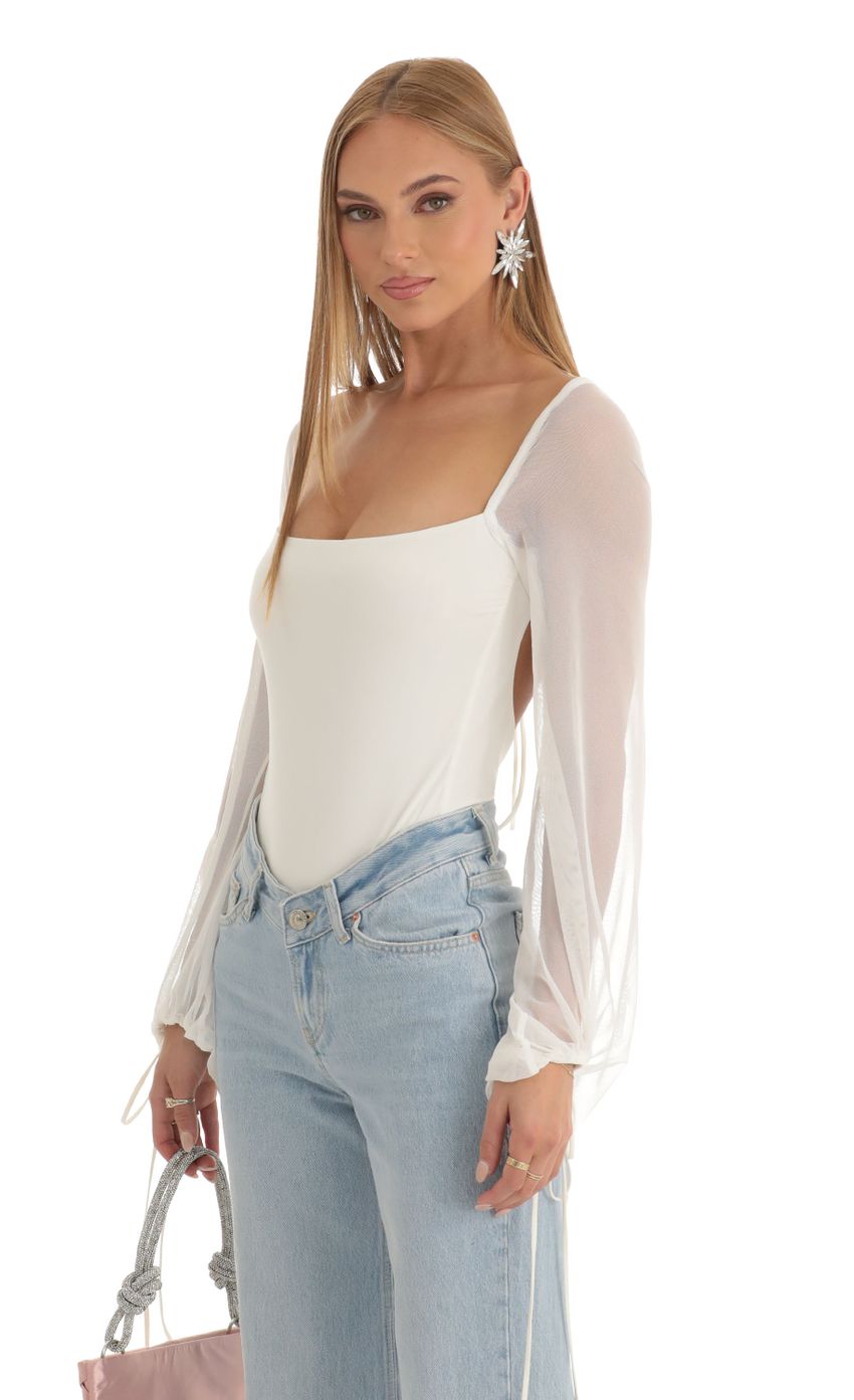 Picture Amory Mesh Long Sleeve Bodysuit in White. Source: https://media.lucyinthesky.com/data/Dec22/850xAUTO/2a5c1525-2958-4476-8d13-263790671130.jpg