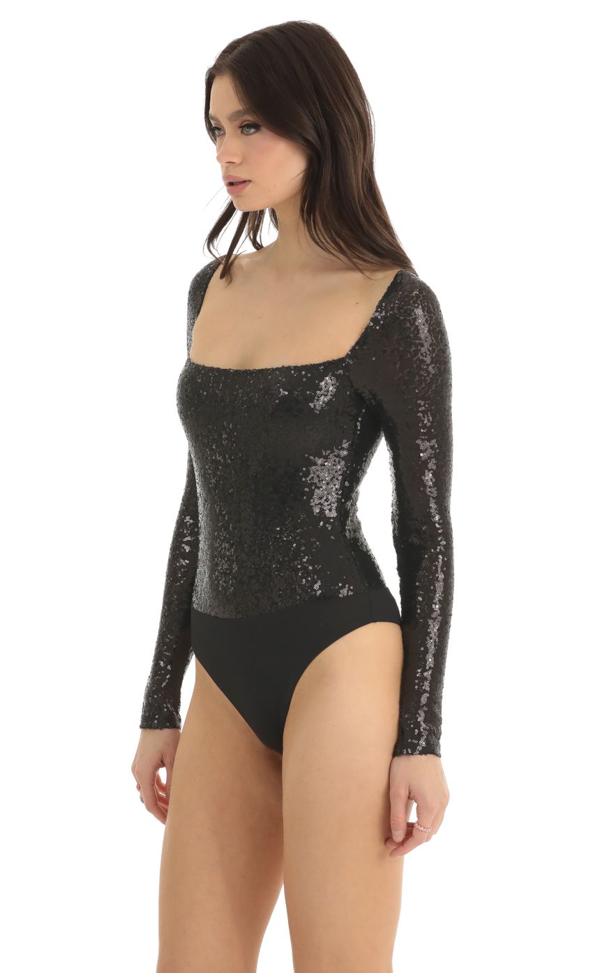 Picture Aislin Sequin Long Sleeve Bodysuit in Black. Source: https://media.lucyinthesky.com/data/Dec22/850xAUTO/2e5484ef-5866-430a-8785-e8b24a3075bf.jpg
