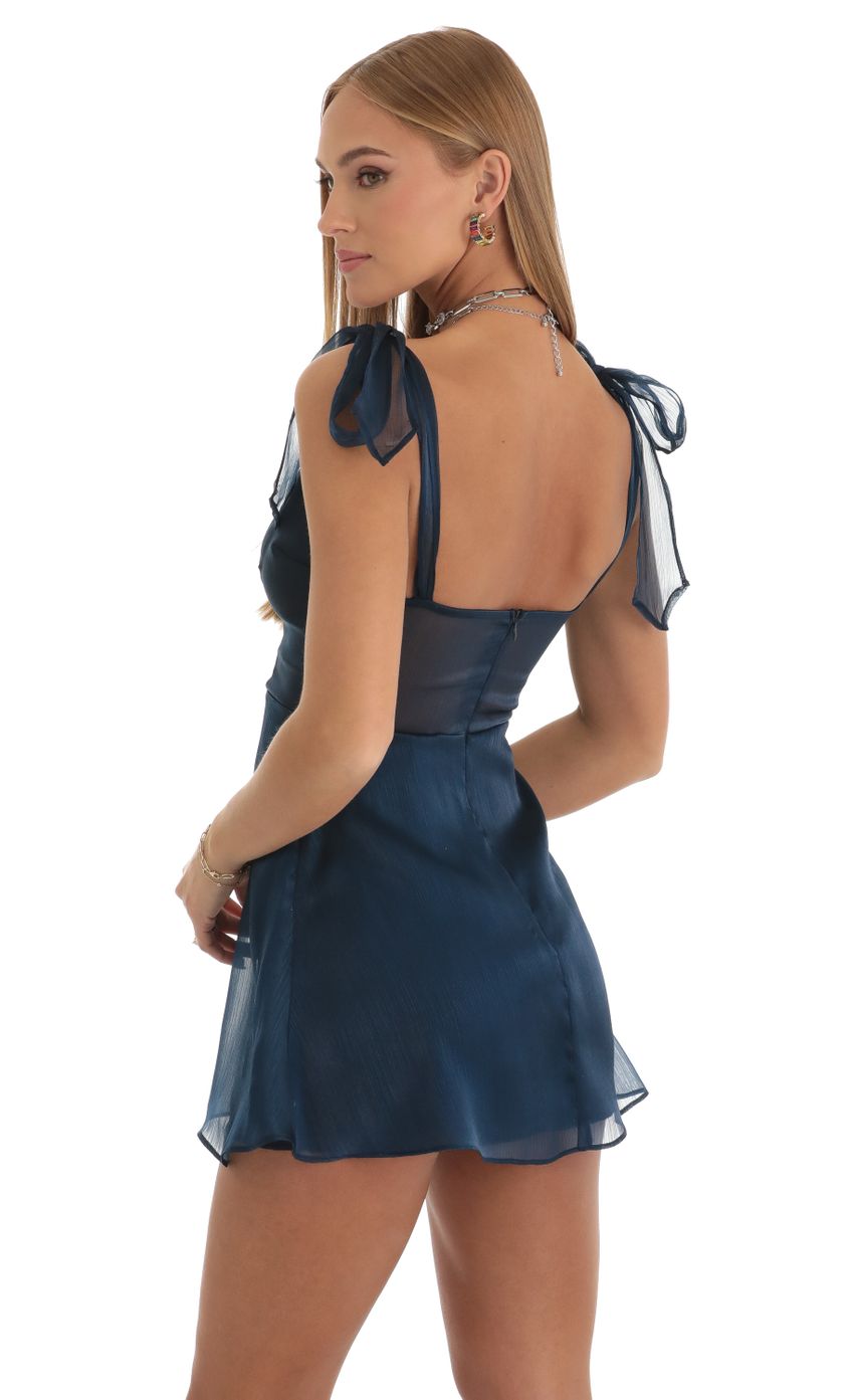 Picture Tia Shiny A-Line Dress in Blue. Source: https://media.lucyinthesky.com/data/Dec22/850xAUTO/307e4701-0804-41a1-80b8-3b4e59176b79.jpg