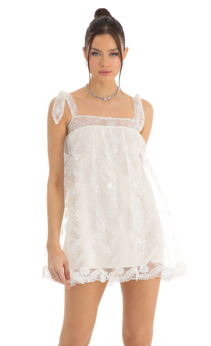 Picture Meme Tulle Sequin Shift Dress in White. Source: https://media.lucyinthesky.com/data/Dec22/850xAUTO/4c7cecfc-87ee-480a-910b-cafc098e912b.jpg