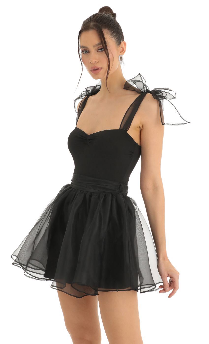 Picture Jaylee Skater Skirt in Black. Source: https://media.lucyinthesky.com/data/Dec22/850xAUTO/4cb493df-737d-4fe3-a0fb-63a7794186e1.jpg