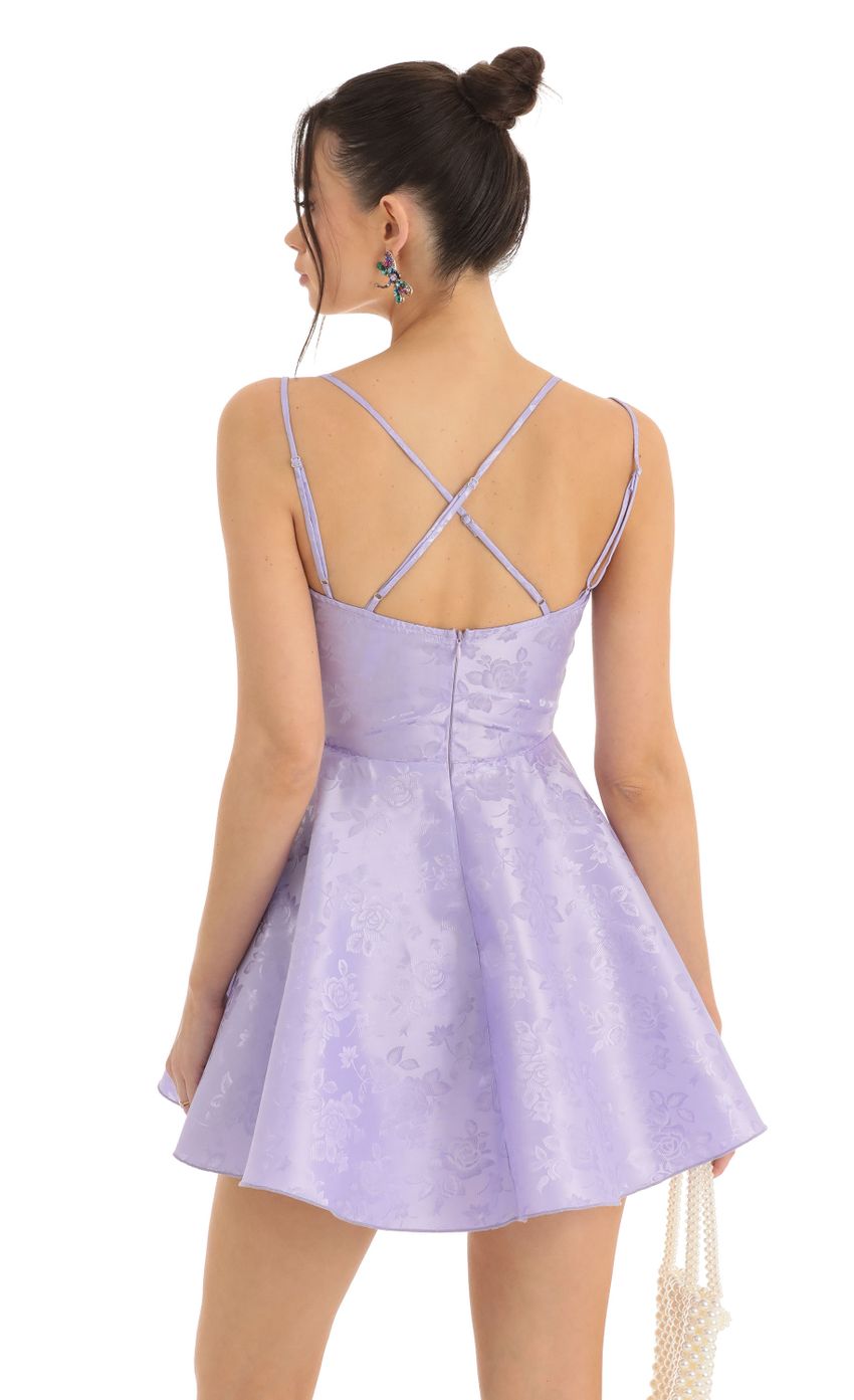 Picture Calem Floral Jacquard Cross Back Dress in Purple. Source: https://media.lucyinthesky.com/data/Dec22/850xAUTO/5f815ab8-542d-4d84-80ec-f0a02204aea4.jpg