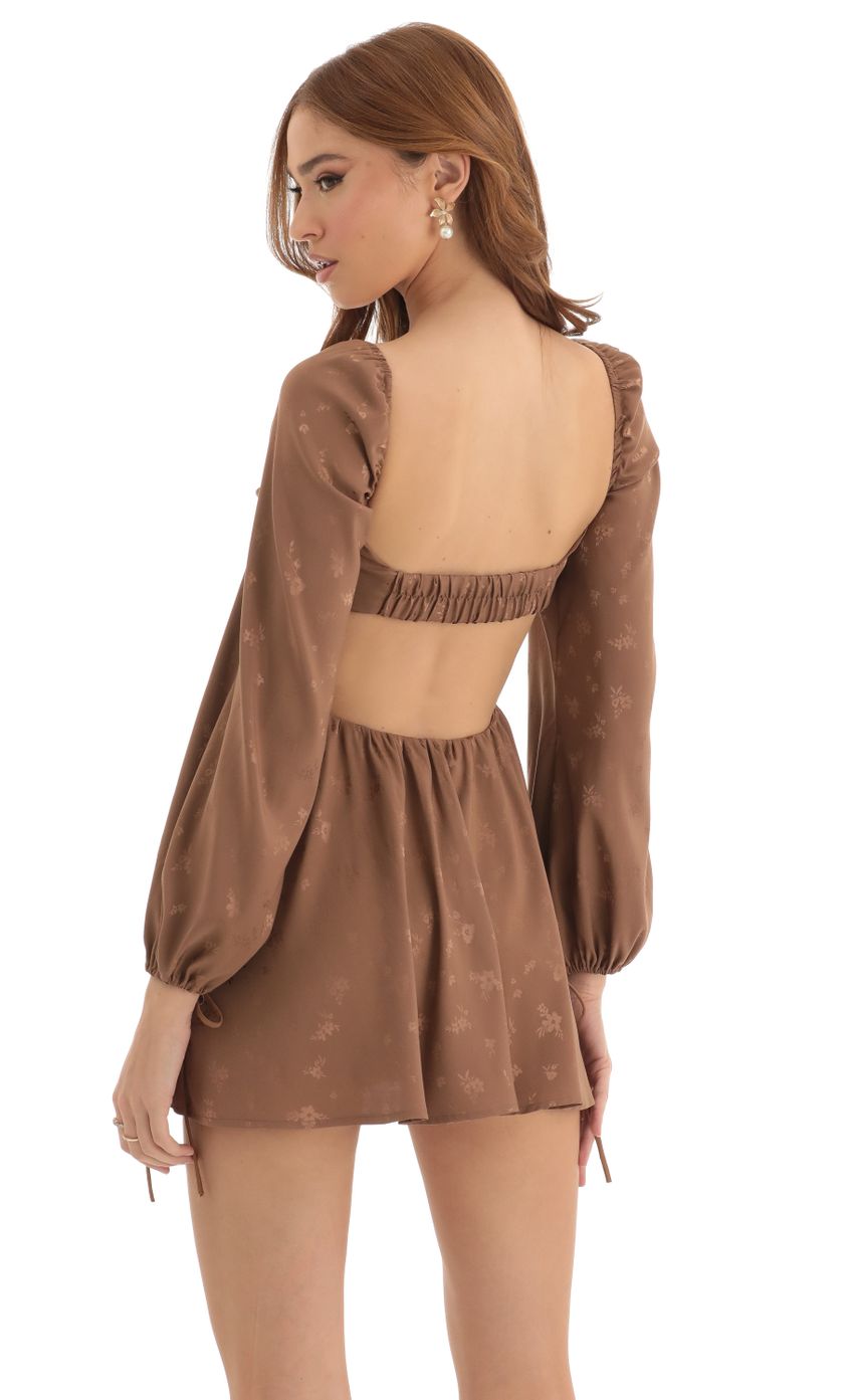 Picture Krista Floral Long Sleeve Fit and Flare Dress in Brown. Source: https://media.lucyinthesky.com/data/Dec22/850xAUTO/706b89fd-554b-4eb5-a255-012b9ab3e28c.jpg