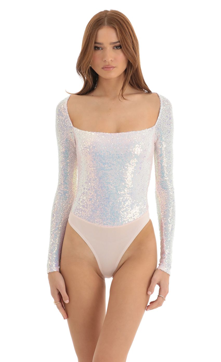 Picture Aislin Iridescent Sequin Long Sleeve Bodysuit in White. Source: https://media.lucyinthesky.com/data/Dec22/850xAUTO/8271ecf9-1845-4f96-b0ff-b43745eb1077.jpg