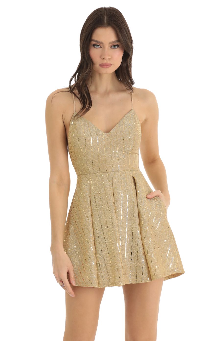 Picture Janine Sequin Striped Fit and Flare Dress in Gold. Source: https://media.lucyinthesky.com/data/Dec22/850xAUTO/8380fd16-f701-4ea7-a1f6-1ad8ebcbf75b.jpg