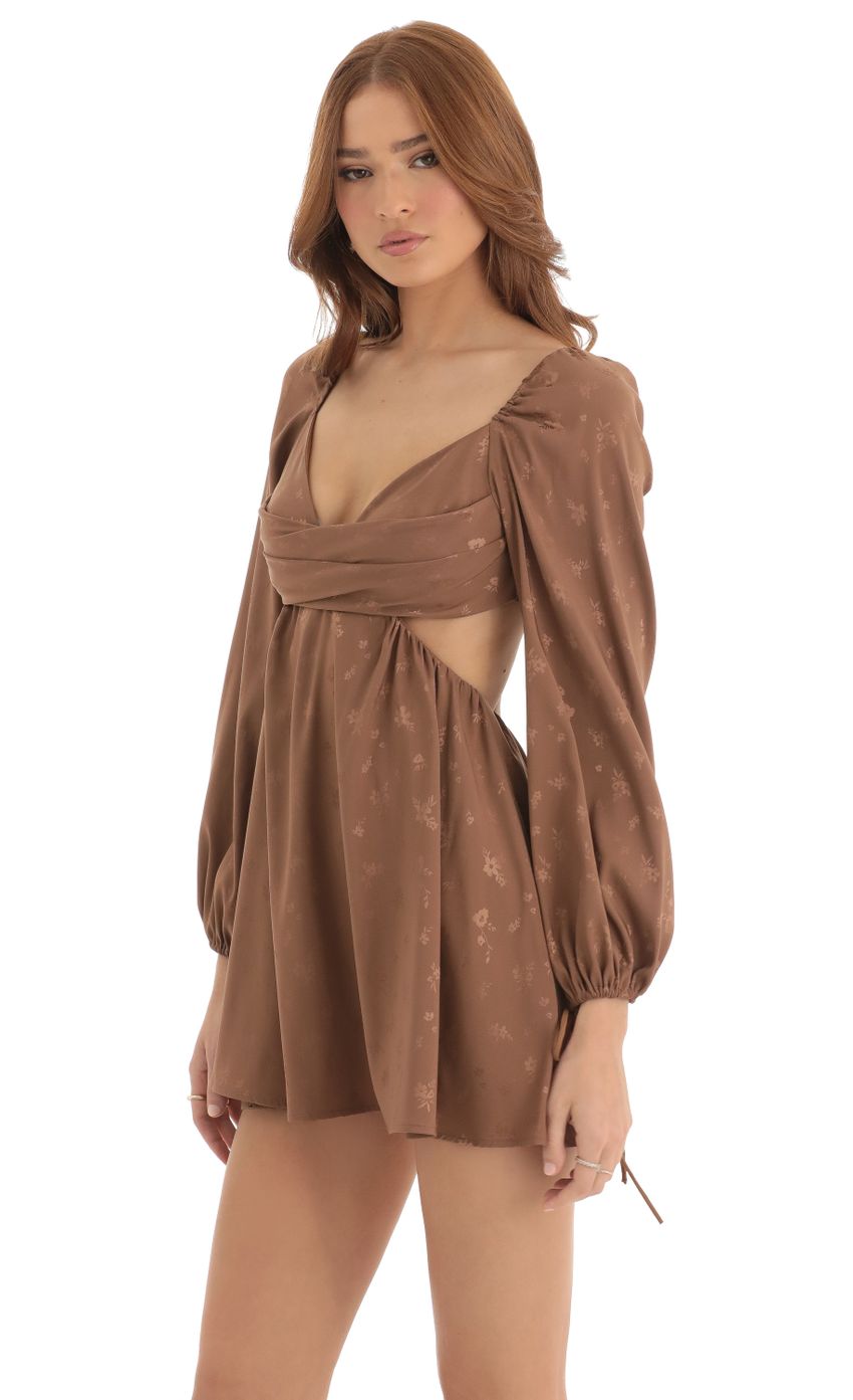 Picture Krista Floral Long Sleeve Fit and Flare Dress in Brown. Source: https://media.lucyinthesky.com/data/Dec22/850xAUTO/94534803-d9d8-4534-83d1-962da5a56d15.jpg