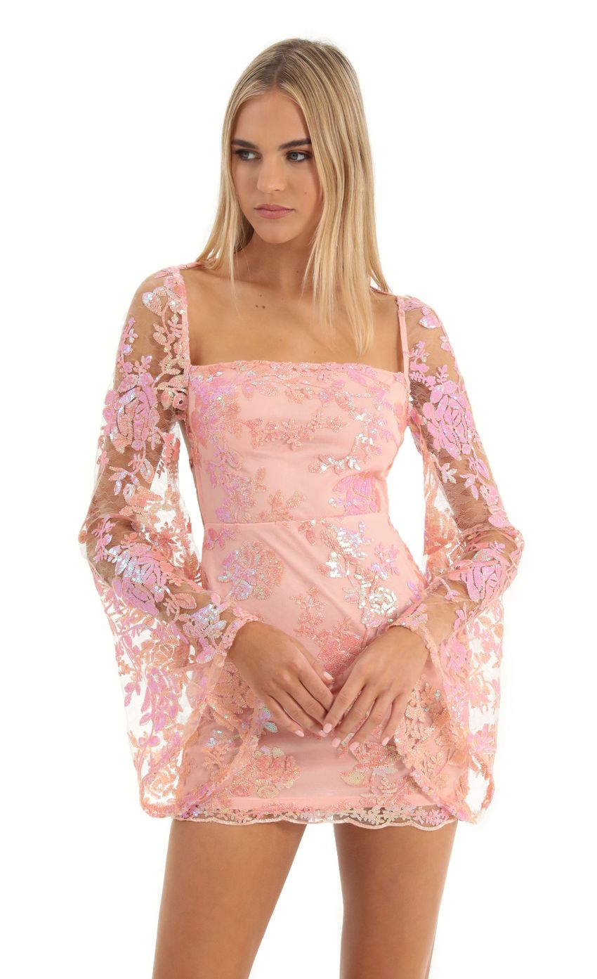 Picture Vida Lace Sequin Flare Sleve Dress in Peach. Source: https://media.lucyinthesky.com/data/Dec22/850xAUTO/9933b0cf-6235-44a5-ad41-e1b3d25bd748.jpg