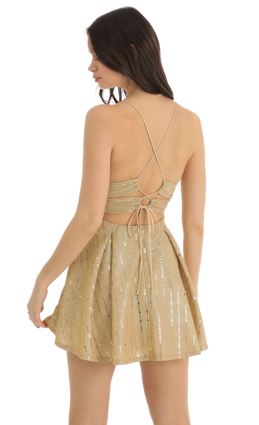 Picture Janine Sequin Striped Fit and Flare Dress in Gold. Source: https://media.lucyinthesky.com/data/Dec22/850xAUTO/99dd0b3f-6d20-4651-8cd6-985778faf84a.jpg