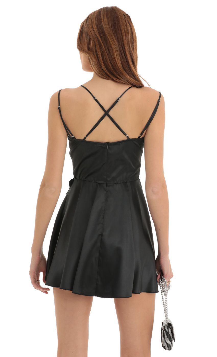 Picture Calem Cross Back Dress in Black. Source: https://media.lucyinthesky.com/data/Dec22/850xAUTO/9f9fd259-275b-4e32-a238-c426eb9d8322.jpg