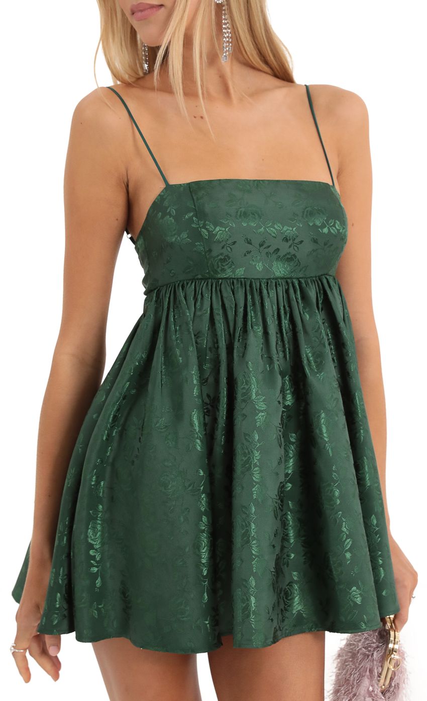 Picture Liora Floral Jacquard Baby Doll Dress in Green. Source: https://media.lucyinthesky.com/data/Dec22/850xAUTO/a33ebe5b-d33c-4650-b5dd-fdb7e7d7d8c3.jpg