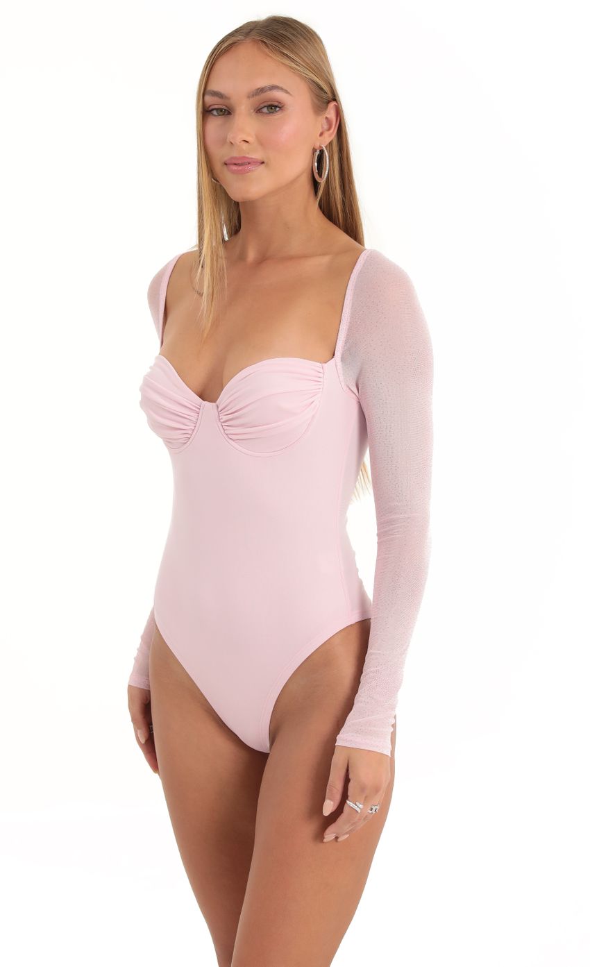 Picture Evonne Glitter Mesh Long Sleeve Bodysuit in Pink. Source: https://media.lucyinthesky.com/data/Dec22/850xAUTO/ae1e7969-3fbf-45d9-9336-33f59353891f.jpg