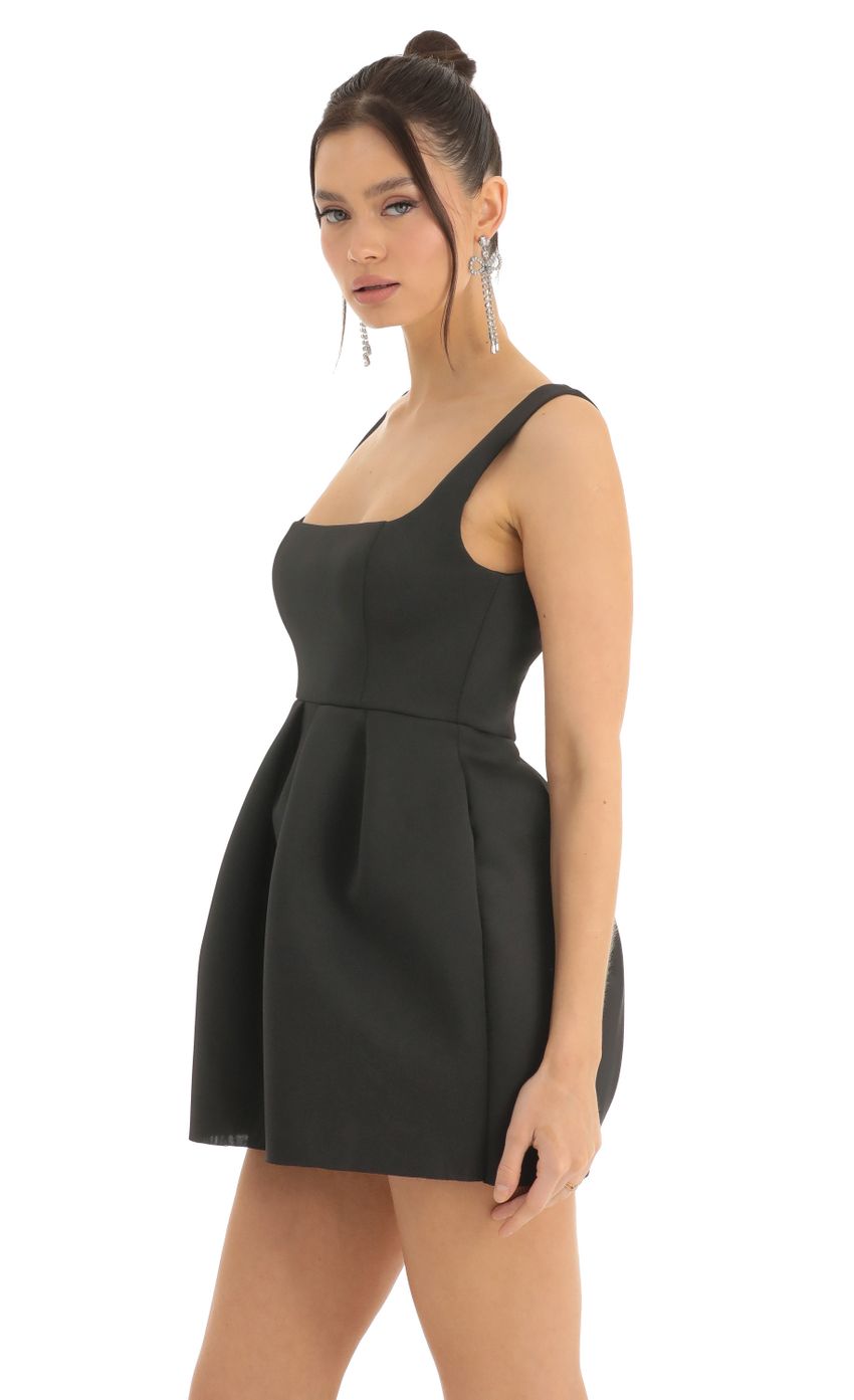 Picture Echo A-Line Dress in Black. Source: https://media.lucyinthesky.com/data/Dec22/850xAUTO/ae77d212-aa56-467a-a7ce-caed779a8779.jpg