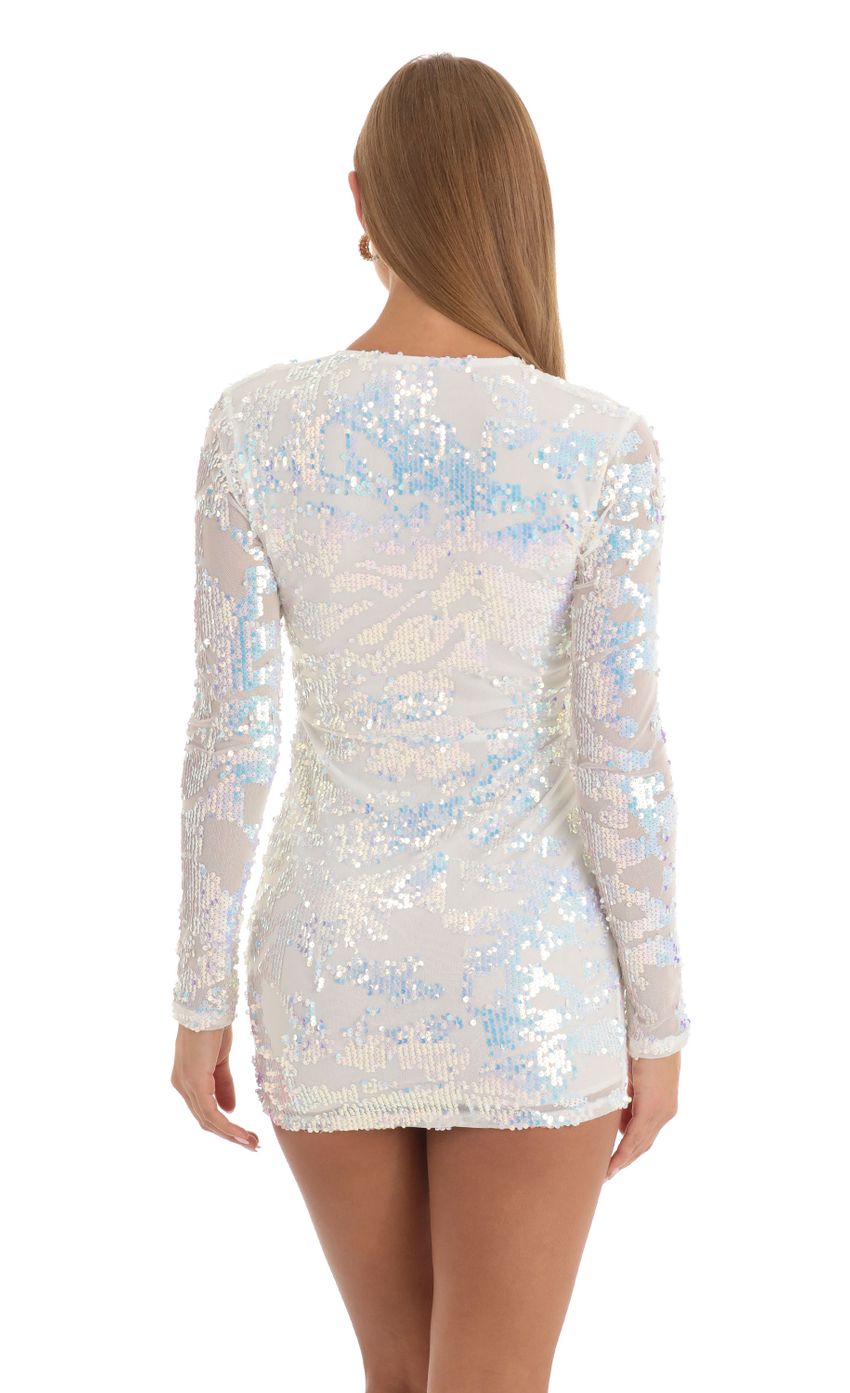 Picture Paris Mesh Iridescent Sequin Plunge Dress in White. Source: https://media.lucyinthesky.com/data/Dec22/850xAUTO/b8b9d994-27cf-4f07-a5fb-c82a586f2fa3.jpg