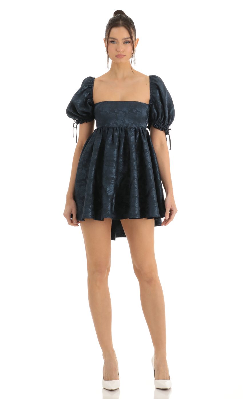Picture Cheri Floral Jacquard Baby Dolly Dress in Navy. Source: https://media.lucyinthesky.com/data/Dec22/850xAUTO/bd28c155-2276-4f69-ab2a-dbf32277b5e3.jpg