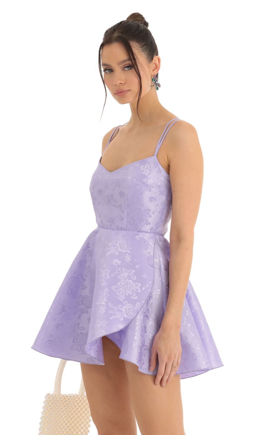 Picture Calem Floral Jacquard Cross Back Dress in Purple. Source: https://media.lucyinthesky.com/data/Dec22/850xAUTO/c8455a3f-4534-48cf-9063-4faea49cdf69.jpg